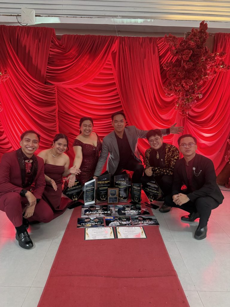 RAC Makati delegates pose with their awards at the ceremony.